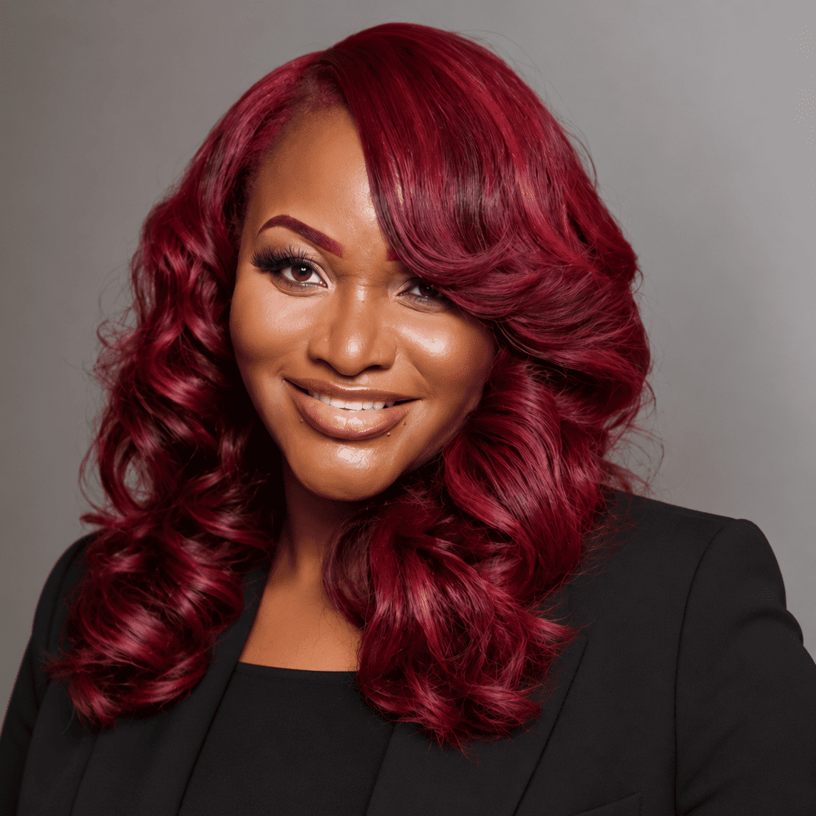 Portrait of Ela B., a professional stylist at Cole Stevens Salon, showcasing their expertise and style.