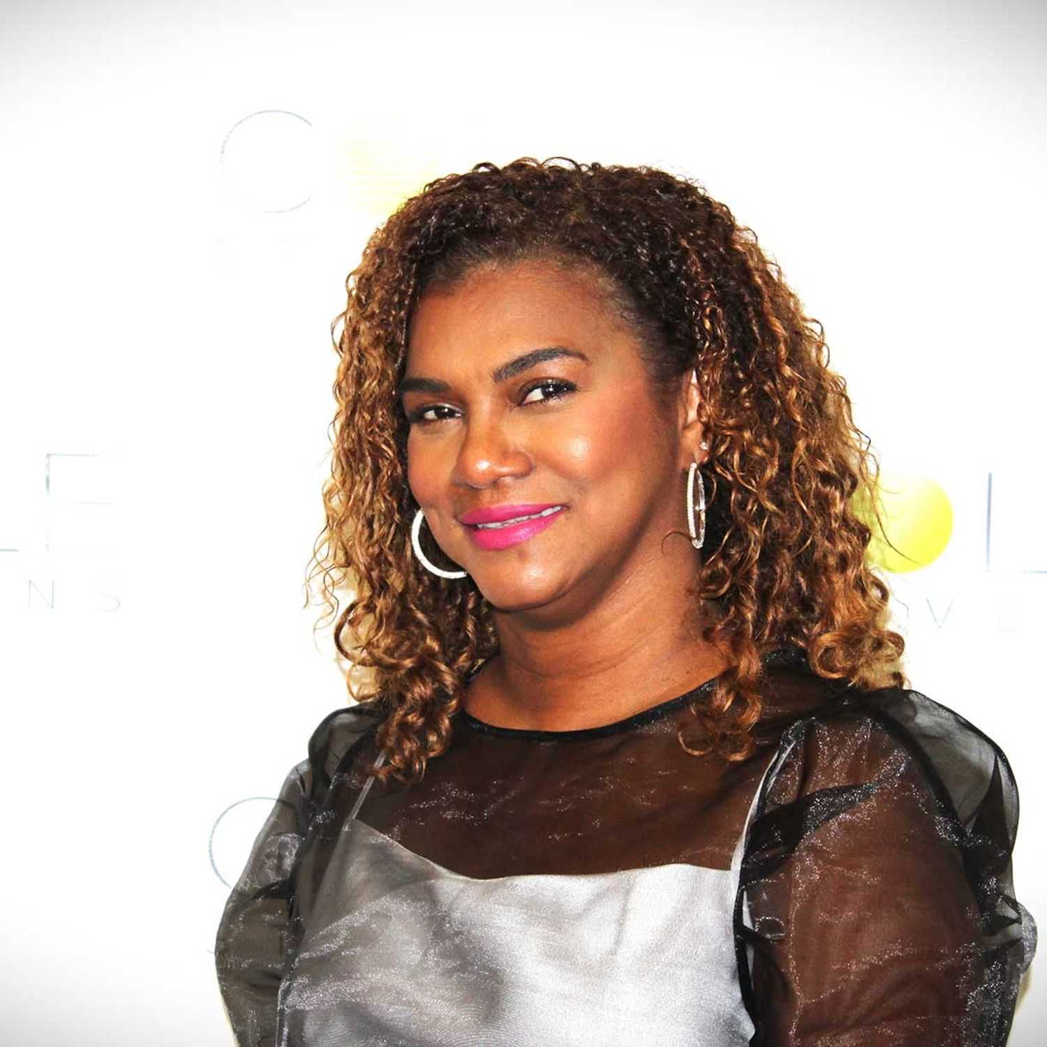 Portrait of Giselle Sencion, a professional stylist at Cole Stevens Salon, showcasing their expertise and style.