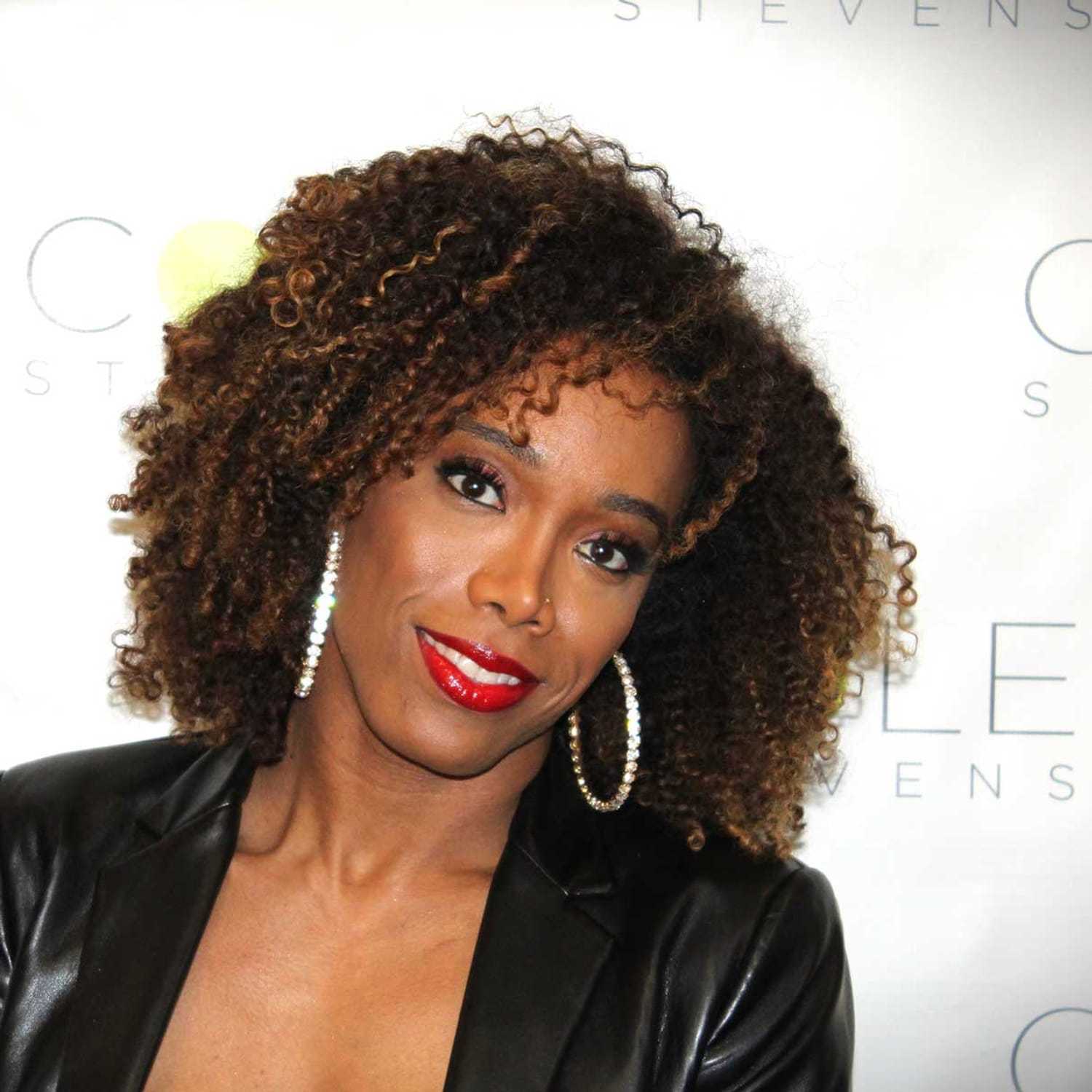 Portrait of Koren Green, a professional stylist at Cole Stevens Salon, showcasing their expertise and style.