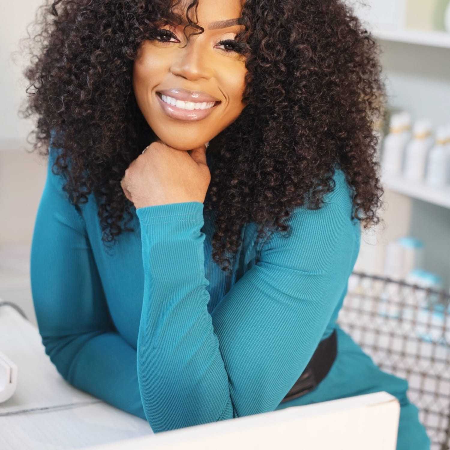 Portrait of Renee Williams, a professional stylist at Cole Stevens Salon, showcasing their expertise and style.