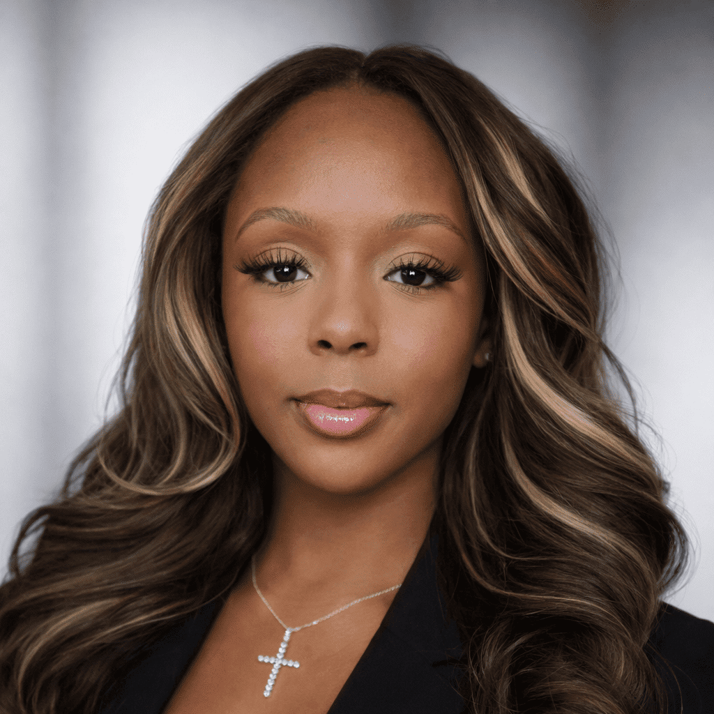 Portrait of Alexia Perry, a professional stylist at Cole Stevens Salon, showcasing their expertise and style.